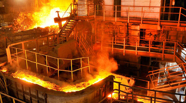 Steel Mill shown in production with hot molten metal moving across the scene, industrial brake system are used extensively here.